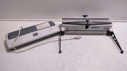 A Ibico HI-Tech Binding System & a Seal-a-Meal Vacuum Food Sealer