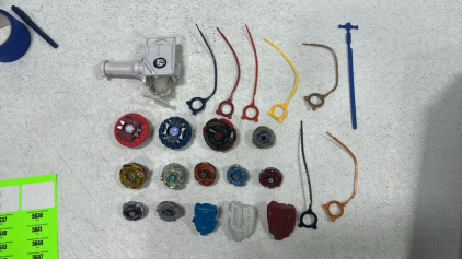 Assortment of Various Beyblades and Beyblade Supplies (More Info in Photos)