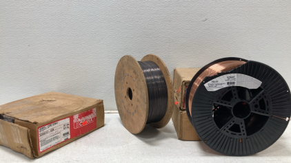 (4) Corex Welding Wire Rolls - (1) Hobart Welding Wire Roll