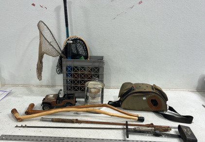 Assorted Fishing Nets & Supploes (2) Cabes (1) Fishing Pole (1) Yard Stick (1) Bag (1) Vintage Jeep Toy (1) Bucket of Samd Dollars