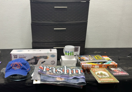 (1) Plastic 3 Drawer Storage Container (1) Car Vacuum (1) BSU Hat (1) Always Sunny in Philidelphia Flag (2) Dog Lighters (1) Board Game (2) Books & more