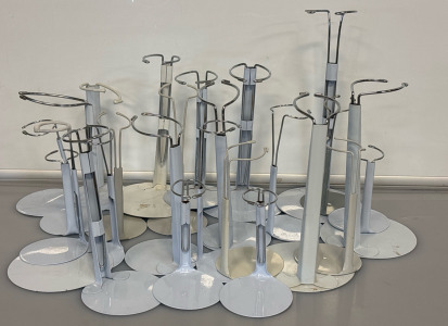 Variety Of Antique Doll Support Stands