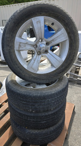 (4) Firestone All-Season Tires - 215/60R17 96T M+S & Jeep Brand Wheel In Each Tire