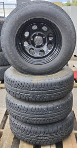 (4) BFGoodrich Advantage T/A Sport LT Tires - 225/75R16 104T & Steel Wheels for Each