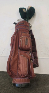 Maroon Golf Caddy With Velociteque Golf Clubs