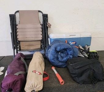 Coleman Xtreme Cooler, Tanning Chair, 49ers Foldable Chair And A Purple Foldable Chair, Sleeping Bag, Youth Size Rollerblades With Helmet, And More!