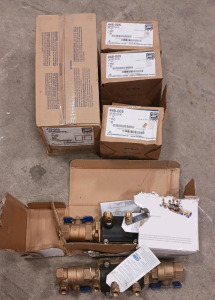 (6) Plumbing Supply Boxes - (2) Zurn Wilkins Double Check Backflow Preventers (3) Boxes of Spears &frac12;" Cap FIPT SCH 40 PVC (1) Box of Spears 1" Coupling Socket SCH 40 PVC