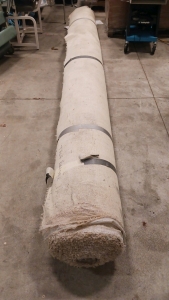 (1) Roll of Tan Textured Carpet - Approx. 12 FT Width