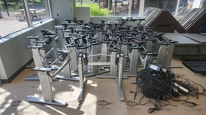 Offsite- Approximately (45) Steelcase Brand Electric Adjustable Desk Units with Stands And cables