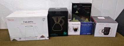 (1) Fabuletta Electric Gooseneck Kettle, (1) Pour Over Coffee Maker, (1) Matcha Tea Set, (1) 2-Pack Of Double Wall Espresso Cups & (1) Porcelain Camera Lens Mug