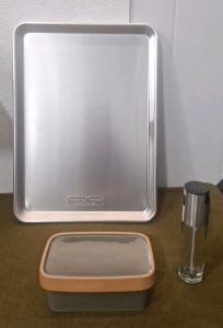 (1) Nordic Ware 12" x 18" Baking Sheet, (1) Ceramic Butter Dish, (1) Edible Oil Spray Bottle & (1) Box Of Assorted Amazon Overstock