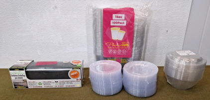 (1) Food Wrap Dispenser, (200) Clear Plastic, 6.25" Plates, (100) 16-Oz Clear Plastic Cups W/ Lids & (10) 32-Oz Clear Plastic Bowl & Lid Sets
