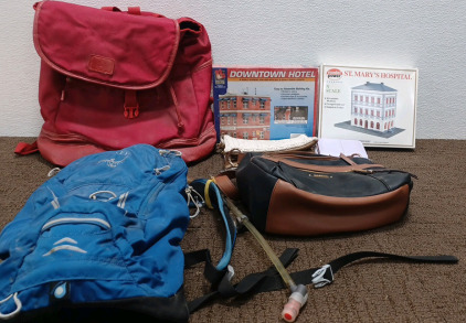 Osprey Water Backpack. Red Backpack. (2) construction game kits. (3) Purses.