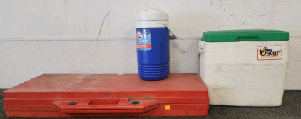 Coleman Oscar Small Cooler, Igloo Beverage Cooler, And A Portable Table And Chairs.