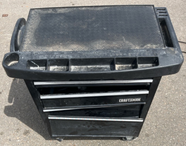 Black Craftsman 3-drawer rolling tool cart With Various Tools
