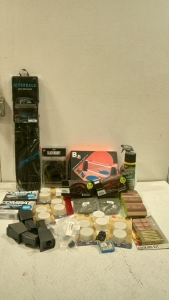 Lot of pesticide, camping cups, outdoor gear, ski goggles, radio carrier, ping pong game, etc.