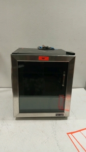 (1) newair mini refrigerator with cord untested