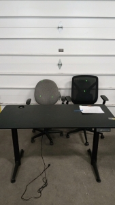 (2) Rolling Desk Chairs, (1) Black Wooden Desk with Power Cord 2 feet 3 inches by 4 feet 7 inches