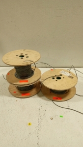 (3) wooden spools of grey wire