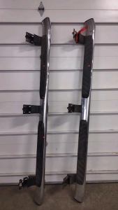 A Pair of Chrome Running Boards for a Ford F-150 Truck