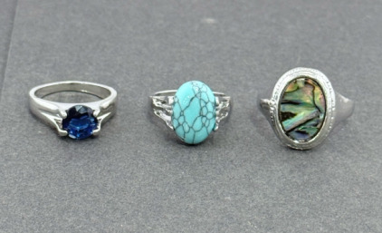 (3) Size 5 1/2 to 10 Rings, Turquoise, Blue Sapphire, And Abalone Shell