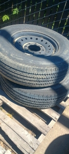 (2) Bridgestone V-Steel Tires w/ Steel Rims - LT245/75R16