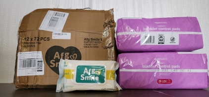 (2) 39 Count Amazon Basics Woman's Bladder Control Pads And A Box Of 12&times;72 Packages of Afg Smile Sensitive Wipes!