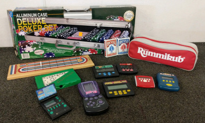 Games, Including Rummikub, Dominos, A Poker Set, And Hand Held Games