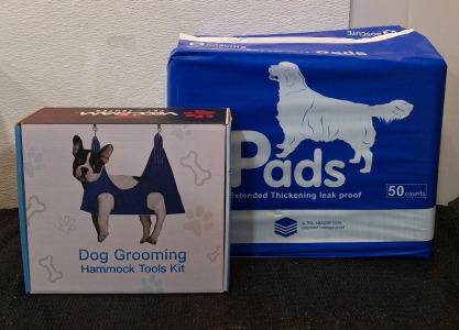 (1) Dog Grooming Hammock W/Tools, (1) 50-Count Pack Of Puppy Pads, 30" x 36"