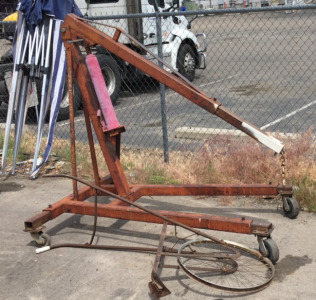 Hydraulic Floor Crane and Vintage Push Plow