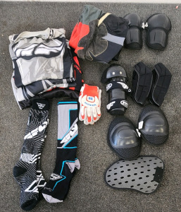 Motor Sports Lot! Including Shirts, Pants, Socks, Pads, And Gloves