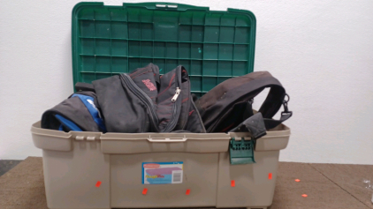 Bucket Of Duffel Bags.