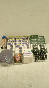 (10) Mikey iPod Microphones, (1) Mets Plush Doll, (6) Mossy Oak Headlamps, (1) Bike Phone Pouch, (1) Football Cards Box, (1) Humidifier, (21) Essential Oils