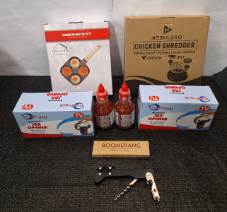 (1) Frenlicious 4-Egg Pan, (1) Nebulexo Chicken/ Beef Shredder, (2) One Touch Automatic Jar Openers, (2) 200ML Bottles Of Crying Thaiger Sriracha Sauce, (1) Boomerang Bottle Opener & (1) Box Of Assorted Amazon Overstock