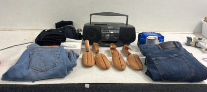 (2) Pairs of Blue Jeans (Eddie Bauer & Levi&rsquo;s) (4) Wooden Shoe Trees (1) Sony CFD-V25 CD Radio Cassette Recorder Boombox (1) Invicta Empty Container (2) Brushes (1) Pair of Black Utility Pants