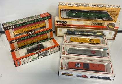 Vintage Trains & Train Cars Including Tyco HO scale model train locomotive &ldquo;Golden Eagle&rdquo;, Life-Like brand HO scale model train locomotive, (3) Life-Like HO scale model train cars & (4) Bachmann HO scale model train cars