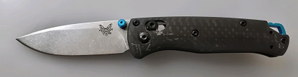 Folding Pocket Knife W/ Carbon Fiber Handle And Blue Accect Coloring