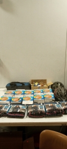 (5) Chill Chaser Base Layers, (10) Packs of Traction Spikes, (1) Duffle Bag, (1) Box of Craft Supplies, (2) Bike Helmets