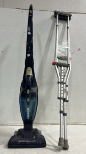 (1) Pair of Crutches (1) Oreck Vacuum Cleaner