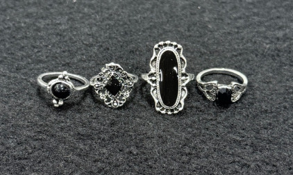 (4) Black Jewel Rings- Unknown Sizes