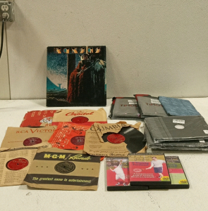 (8) Vinyl Records, (3) DVDs, and (6) iPad Cases