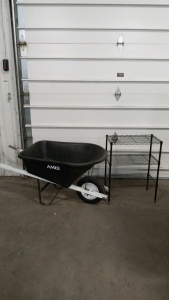 (1) large Wheelbarrow and (1) Metal Shelf