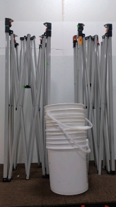 Pop Stands For Canopy & (3) Construction Buckets.