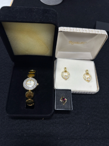 (1) Gold Quartz Watch (1) Pair Of Gold & Pearl Earrings (1) Red Stone Ring