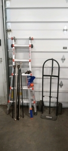 (1) Little Giant Velocity Ladder, (1) Black Truck Dolly, (1) Set of Curtain Rods, (1) Nerf Hockey Game