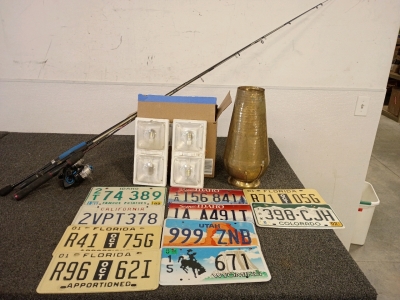 Fishing Poles, Outdoor Lights And Collectable License Plates