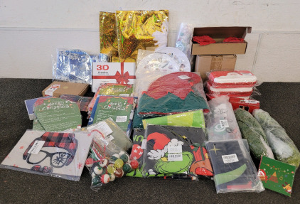 Assorted Christmas Decorations, Including Stockings, Elf Hats, And More