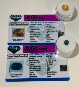 (2) Certified Natural Gemstones Including 5.35ct Oval Padpaeadscha Orange Sapphire, And 1.90ct Oval Bicolor Paraibatourmaline