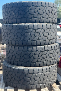 (4) Toyo Open Country A/T III Tires