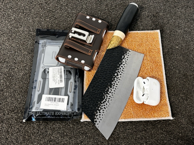 Beautiful Butcher Knife, Apple Bluetooth EarPods, Leather Phone Holster, and Samsung Galaxy S21 Ultra Phone Case